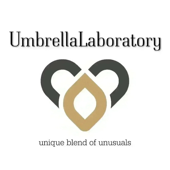 Organic wooden spiral hoop earrings fake gauges by umbrellalaboratory - Picture 6 of 6